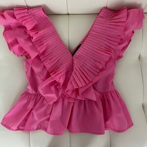 Pink sleeveless ruffle top